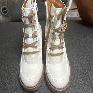 Off white platform high top boots.